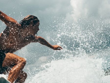 Surfer catching a wave.